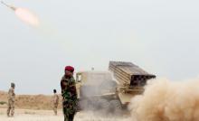 Iraqi soldiers fire a rocket toward Islamic State militants on the outskirts of the Makhmour south of Mosul, Iraq, March 25, 2016. PHOTO BY REUTERS/Azad Lashkaril