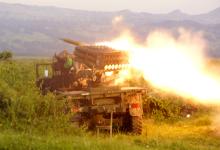 Rockets are fired from a Congolese army vehicle in the direction of M23 rebels in Kibumba, north of Goma