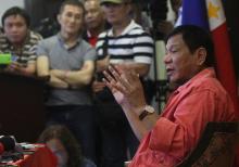 Philippine President-elect Rodrigo Duterte gestures during a news conference to apologise to Canadian Prime Minister Justin Trudeau, at a hotel in Davao city, southern Philippines, May 26, 2016. PHOTO BY REUTERS/Stringer