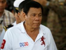 Philippine President Rodrigo Duterte arrives at the military's Camp Tecson to talk to soldiers in San Miguel, Bulacan in northern Philippines, September 15, 2016. PHOTO BY REUTERS/Erik De Castro