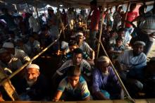 Rohingya refugees line up to receive humanitarian aid in Balukhali refugee camp near Cox's Bazar, Bangladesh, October 26, 2017. REUTERS/Hannah McKay