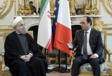 French President Francois Hollande (R) meets Iran's President Hassan Rouhani at the Elysee Palace in Paris, France, January 28, 2016. PHOTO BY REUTERS/Stephane de Sakutin