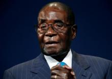 Zimbabwean President Robert Mugabe leaves the stage after participating in a discussion at the World Economic Forum on Africa 2017 meeting in Durban, South Africa, May 4, 2017. PHOTO BY REUTERS/Rogan Ward