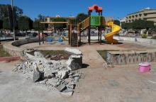 Rubble is seen at a playground in a garden where a rocket hit a residential district in Benghazi, May 30, 2015. PHOTO BY REUTERS/Esam Omran Al-Fetori