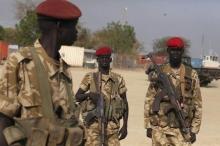 SPLA soldiers stand at the airport in Bor, January 19, 2014. PHOTO BY REUTERS/Andreea Campeanu