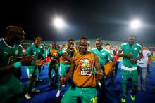 Senegal's Sadio Mane and teammates celebrate after the match. PHOTO BY REUTERS/Mohamed Abd El Ghany