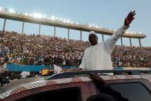 Senegal's President Macky Sall greets his supporters as he arrives to attend his final campaign rally in Dakar, Senegal, February 22, 2019. PHOTO BY REUTERS/Zohra Bensemra