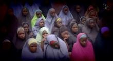 A still image from a video posted by Nigerian Islamist militant group Boko Haram on social media, seen by Reuters on August 14, 2016, shows dozens of girls the group said are school girls kidnapped in the town of Chibok in 2014. PHOTO BY REUTERS/Social Media