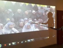 A student who escaped when Boko Haram rebels stormed a school and abducted schoolgirls, identifies her schoolmates from a video released by the Islamist rebel group at the Government House in Maiduguri, Borno State, May 15, 2014. PHOTO BY REUTERS/Stringer