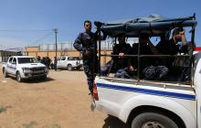 Palestinian security forces loyal to Hamas ride a pickup truck during an operation to arrest the main suspect in an assassination attempt against Palestinian Prime Minister Rami Hamdallah, in the central Gaza Strip, March 22, 2018. PHOTO BY REUTERS/Ibraheem Abu Mustafa