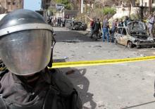 A security personnel stands guard, during the forensics team investigation of a bombing in Alexandria, Egypt, March 24, 2018. PHOTO BY REUTERS/Fawzy Abdel Hamied