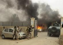 Afghan security forces arrive at the site of an attack in Kunduz province, October 27, 2014. PHOTO BY REUTERS/Stringer