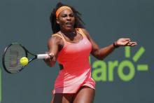 Serena Williams hits a forehand against Svetlana Kuznetsova (not pictured) on day eight of the Miami Open at Crandon Park Tennis Center, Key Biscayne, FL, Mar 30, 2015. PHOTO BY USA TODAY/Geoff Burke