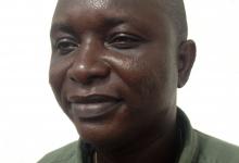 Sheik Umar Khan, head doctor fighting the deadly tropical virus Ebola in Sierra Leone, poses for a picture in Freetown