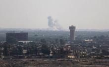 Smoke rises in Egypt's North Sinai as seen from the border of southern Gaza Strip with Egypt, July 1, 2015. PHOTO BY REUTERS/Ibraheem Abu Mustafa