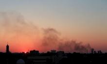 Black smoke billows in the sky above areas where clashes are taking place between pro-government forces, who are backed by the locals, and the Shura Council of Libyan Revolutionaries, an alliance of former anti-Gaddafi rebels, who have joined forces with the Islamist group Ansar al-Sharia in Benghazi, Libya July 8, 2015. PHOTO BY REUTERS/Esam Omran Al-Fetori