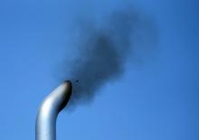 A truck engine is tested for pollution exiting its exhaust pipe as California Air Resources field representatives (unseen) work a checkpoint set up to inspect heavy-duty trucks traveling near the Mexican-U.S. border in Otay Mesa, California, September 10, 2013. PHOTO BY REUTERS/Mike Blake