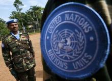 Sri Lankan Army soldiers march during a passing out ceremony before departing for Haiti as U.N. peacekeepers, at Panagoda army base, about 45 km (28 miles) from Colombo, December 23, 2009. PHOTO BY REUTERS/Stringer