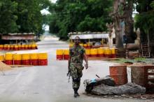 A soldier walks past a checkpoint in Bama, Borno State, Nigeria, August 31, 2016. PHOTO BY REUTERS/Afolabi Sotunde