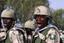 Nigerian soldiers gather during preparations for their deployment to Mali, at the army's peacekeeping centre in Nigeria's northern state of Kaduna, January 17, 2013. PHOTO BY REUTERS/Afolabi Sotunde