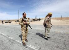 Libyan soldiers man a checkpoint in Wadi Bey, west of the Islamic State-held city of Sirte, February 23, 2016. PHOTO BY REUTERS/Ismail Zitouny