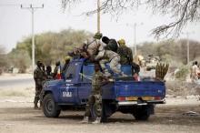 Chadian soldiers sit in a military pickup truck in Damask, March 24, 2015. PHOTO BY REUTERS/Joe Penney