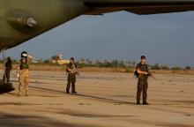 British soldiers stand guard during the visit of defence secretary Liam Fox at Misrata airport 200km (124.2 miles) east of Tripoli, October 8, 2011. PHOTO BY REUTERS/Suhaib Salem