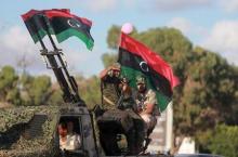 Members of the Libyan army give protection to a demonstration in support of the Libyan army under the leadership of General Khalifa Haftar, in Benghazi, Libya, August 14, 2015. PHOTO BY REUTERS/Esam Omran Al-Fetori