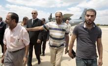 Tunisian diplomatic staff who were kidnapped in Libya a week ago, arrive at the airport in Tunis, Tunisia, June 19, 2015. PHOTO BY REUTERS/Zoubeir Souissi