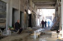 Men restore their shops which were destroyed by the war in an old popular market, known as the Souk al-Jureid, in Benghazi, Libya, February 7, 2019. PHOTO BY REUTERS/Esam Omran Al-Fetori