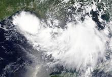 Tropical Storm Barry is shown in the Gulf of Mexico approaching the coast of Louisiana, U.S. in this July 11, 2019 NASA satellite. PHOTO BY REUTERS/NASA