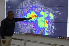 A member of the Emergency Operations Committee (COE) monitors the trajectory of Storm Dorian in Santo Domingo, Dominican Republic, August 27, 2019. PHOTO BY REUTERS/Ricardo Rojas