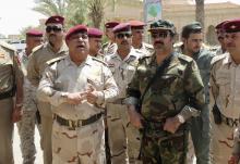 Sunni tribal leader Sheikh Ahmed Abu Risha (R) and General Rashid Flaih, Operations Chief of Anbar Province (L) visit a reinforcement operation by Iraqi security forces for Anbar Province, in Ramadi