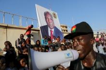 Supporters of presidential candidate Zephirin Diabre cheer at Diabre's campaign rally in Ouagadougou, Burkina Faso, November 25, 2015. PHOTO BY REUTERS/Joe Penney