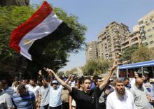 Supporters of muslim brotherhood shout slogans