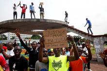 Supporters of Martin Fayulu, runner-up in Democratic Republic of Congo's presidential election, protest in front of the constitutional court as they wait for him to deliver his appeal contesting Congo's National Independent Electoral Commission (CENI) results of the presidential election in Kinshasa, Democratic Republic of Congo, January 12, 2019. PHOTO BY REUTERS/Baz Ratner