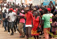 Supporters of Ugandan musician turned politician, Robert Kyagulanyi also known as Bobi Wine chant slogans outside his home after he arrived from the U.S. in Kampala, Uganda, September 20, 2018. PHOTO BY REUTERS/Francis Mukasa