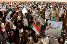 Supporters of Lieutenant General Mohamed Hamdan Dagalo, deputy head of the military council and head of paramilitary Rapid Support Forces (RSF), cheer as he arrives at a meeting in Aprag village, 60 kilometers from Khartoum, Sudan, June 22, 2019. PHOTO BY REUTERS/Umit Bektas