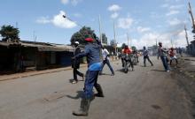 A supporter of Kenya's opposition Coalition for Reforms and Democracy (CORD) uses a sling to hurl stones towards their opponents during a protest against at the Independent Electoral and Boundaries Commission (IEBC) to demand the disbandment of the electoral body ahead of next year's election in Nairobi, Kenya, June 6, 2016. PHOTO BY REUTERS/Thomas Mukoya