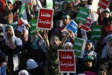 Supporters of the Jordanian Muslim Brotherhood take part in a rally in Amman, celebrating what Hamas say is its victory in Gaza