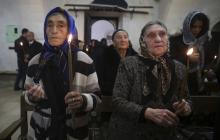 Syriac Christians from Turkey and Syria attend a mass at the Mort Shmuni Syriac Orthodox Church in the town of Midyat, in Mardin province of southeast Turkey in this February 2, 2014 file photo