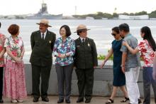 Taiwan's President Tsai Ing-wen, (3rd L), on transit enroute to Pacific island allies, stands with delegates and park service members at the USS Arizona Memorial at Pearl Harbor near Honolulu, Hawaii, U.S., October 28, 2017. PHOTO BY REUTERS/Marco Garcia