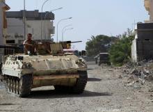 An armoured vehicle of Libyan forces allied with the U.N.-backed government is pictured during a battle with Islamic State militants in neighbourhood Number Three in Sirte, Libya, October 9, 2016. PHOTO BY REUTERS/Ismail Zitouny