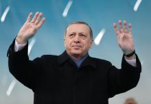 Turkish President Tayyip Erdogan greets his supporters during a ceremony in Afyonkarahisar, Turkey March 15, 2017. PHOTO BY REUTERS/Murat Cetinmuhurdar/Presidential Palace