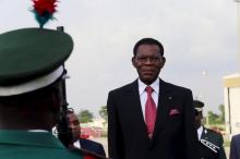 Equatorial Guinea's President Teodoro Obiang Nguema Mbasogo inspects a guard of honour upon his arrival at the presidential airport in Abuja, Nigeria, May 28, 2015. PHOTO BY REUTERS/Afolabi Sotunde