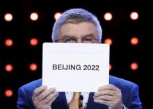 Thomas Bach President of the International Olympic Committee (IOC) announces Beijing as the city to host the the 2022 Winter Olympics during the 128th International Olympic Committee Session, in Malaysia's capital city of Kuala Lumpur, July 31, 2015. PHOTO BY REUTERS/Edgar Su