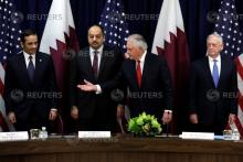 U.S. Secretary of State Rex Tillerson (2nd R) next to Defense Secretary Jim Mattis (R) welcomes Qatari Foreign Minister Sheikh Mohammed bin Abdulrahman Al Thani (L) and Defense Minister Khalid bin Muhammad al-Attiyah at the opening session of the inaugural U.S.-Qatar Strategic Dialogue in Washington, U.S., January 30, 2018. PHOTO BY REUTERS/Yuri Gripas