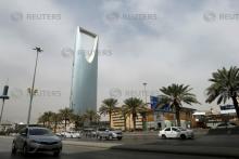 Cars drive past the Kingdom Centre Tower in Riyadh, Saudi Arabia, January 30, 2018. PHOTO BY REUTERS/Faisal Al Nasser