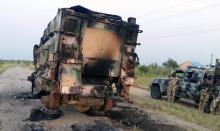 A damaged military vehicle is pictured in the northeast town of Gudumbali, after an attack by members of Islamic State in West Africa (ISWA), Nigeria, September 11, 2018. PHOTO BY REUTERS/Kolawole Adewale