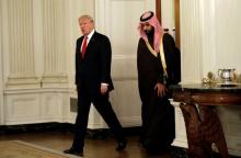 U.S. President Donald Trump and Saudi Deputy Crown Prince and Minister of Defense Mohammed bin Salman enter the State Dining Room of the White House in Washington, U.S., March 14, 2017. PHOTO BY REUTERS/Kevin Lamarque
